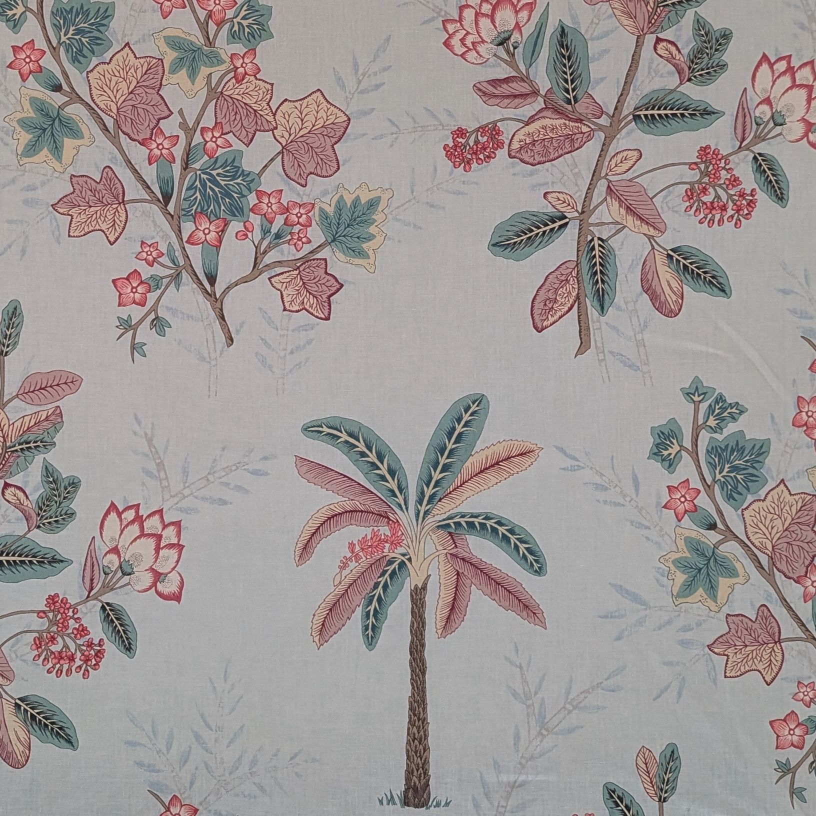 Pattern of palm trees and floral branches on a light background