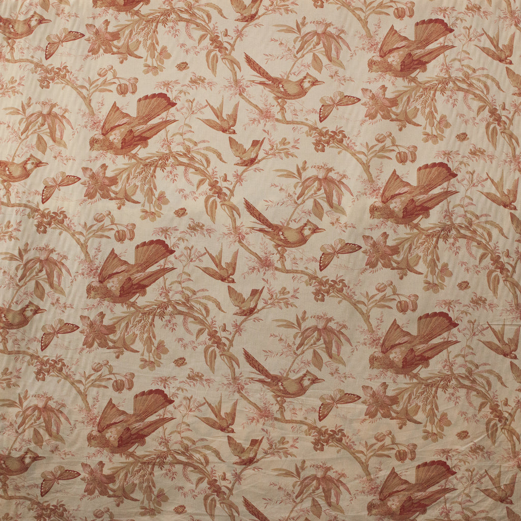 Patterned fabric with birds and floral designs in red on a beige background