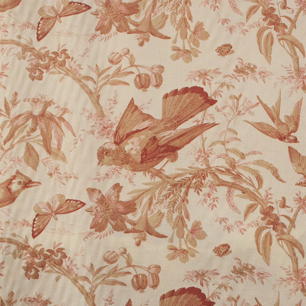 Floral and bird patterned fabric with birds and flowers on a beige background