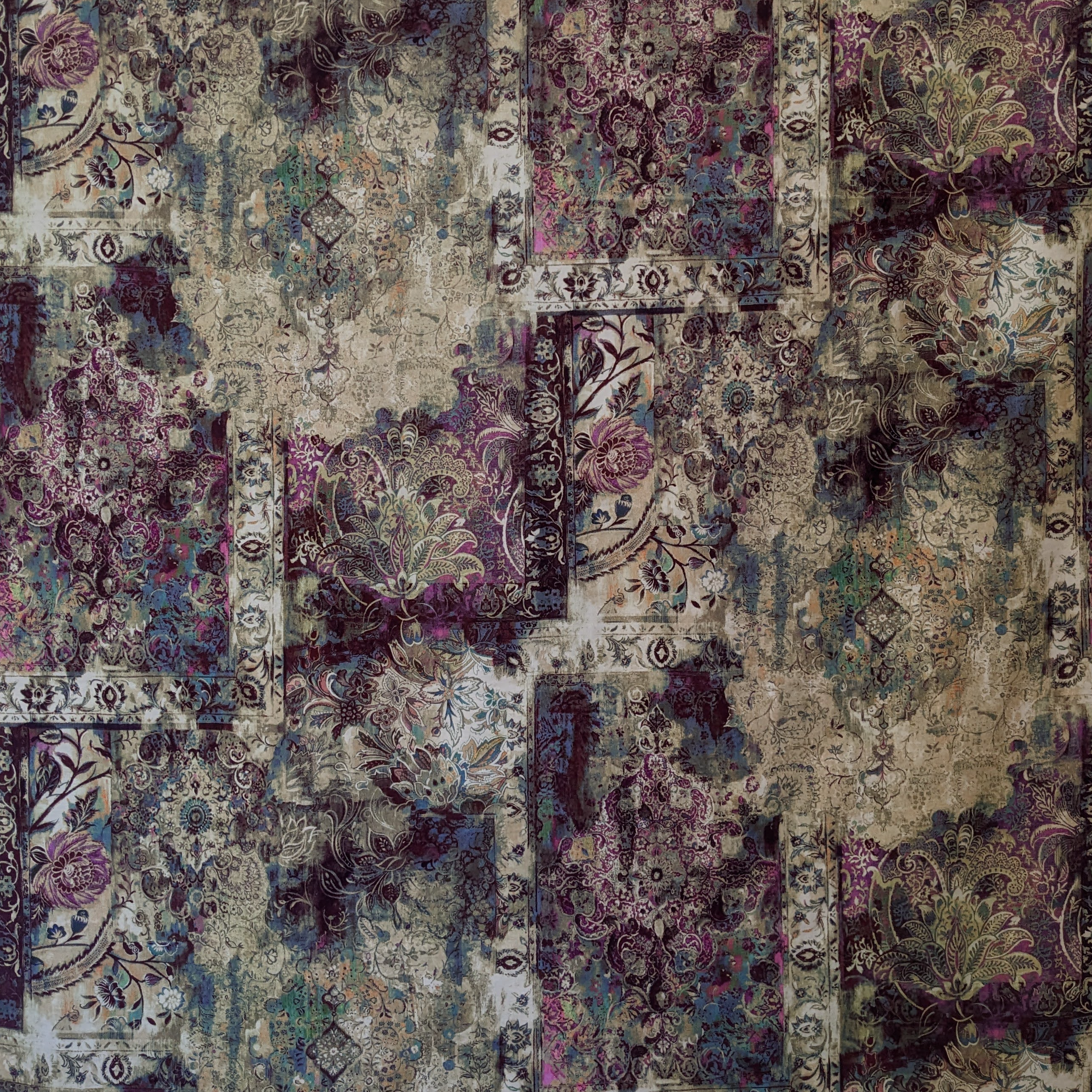 Persian-patterned velvet fabric with a mix of purple, beige, and green colors.