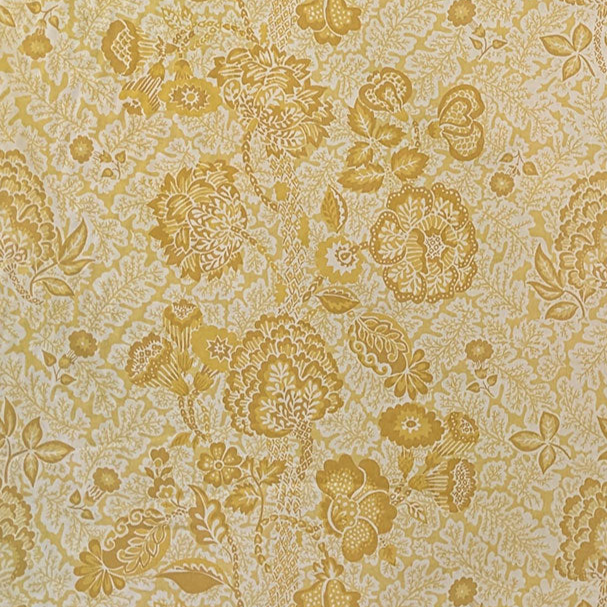 Patterned fabric with yellow floral design on a beige background