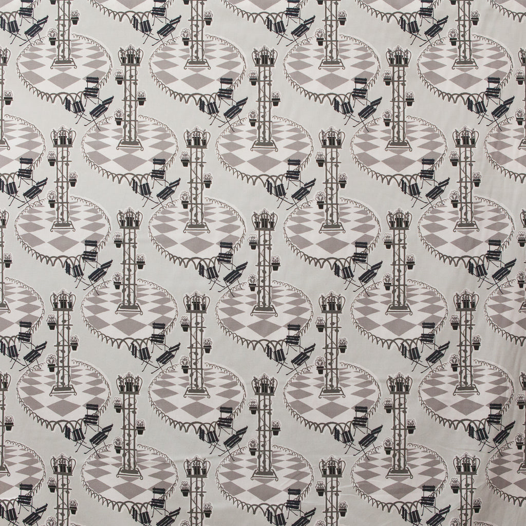 Garden patio scene on fabric in grey and black 