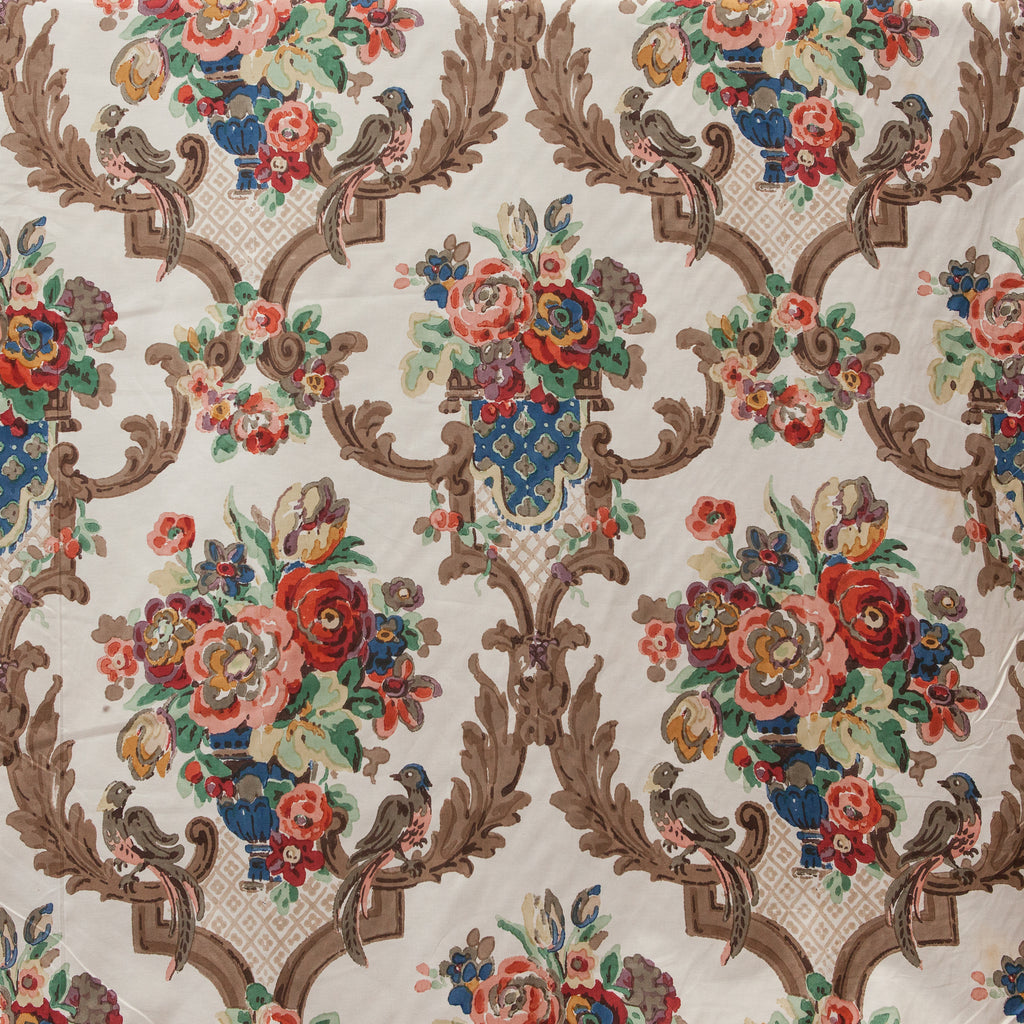 Decorative fabric with floral and bird pattern on a beige background