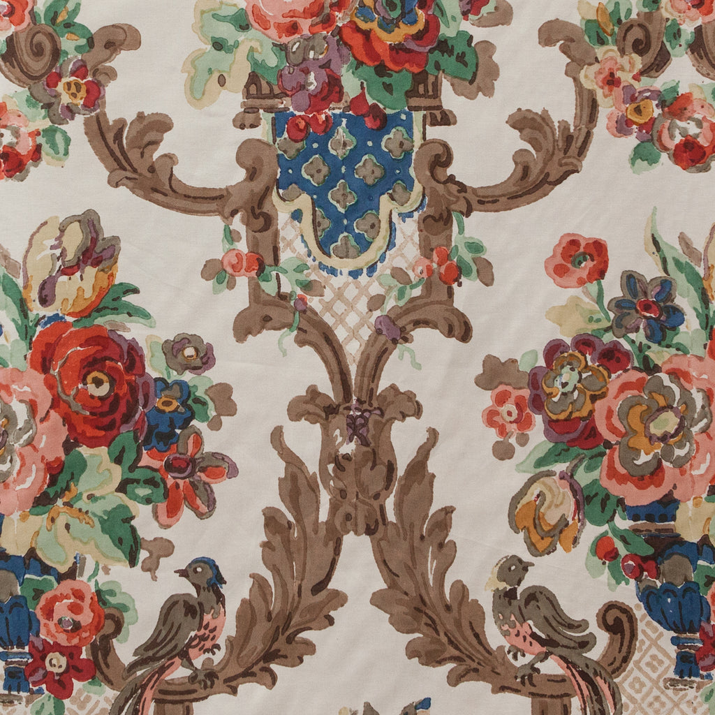Decorative fabric pattern with floral and leaf designs on a beige background