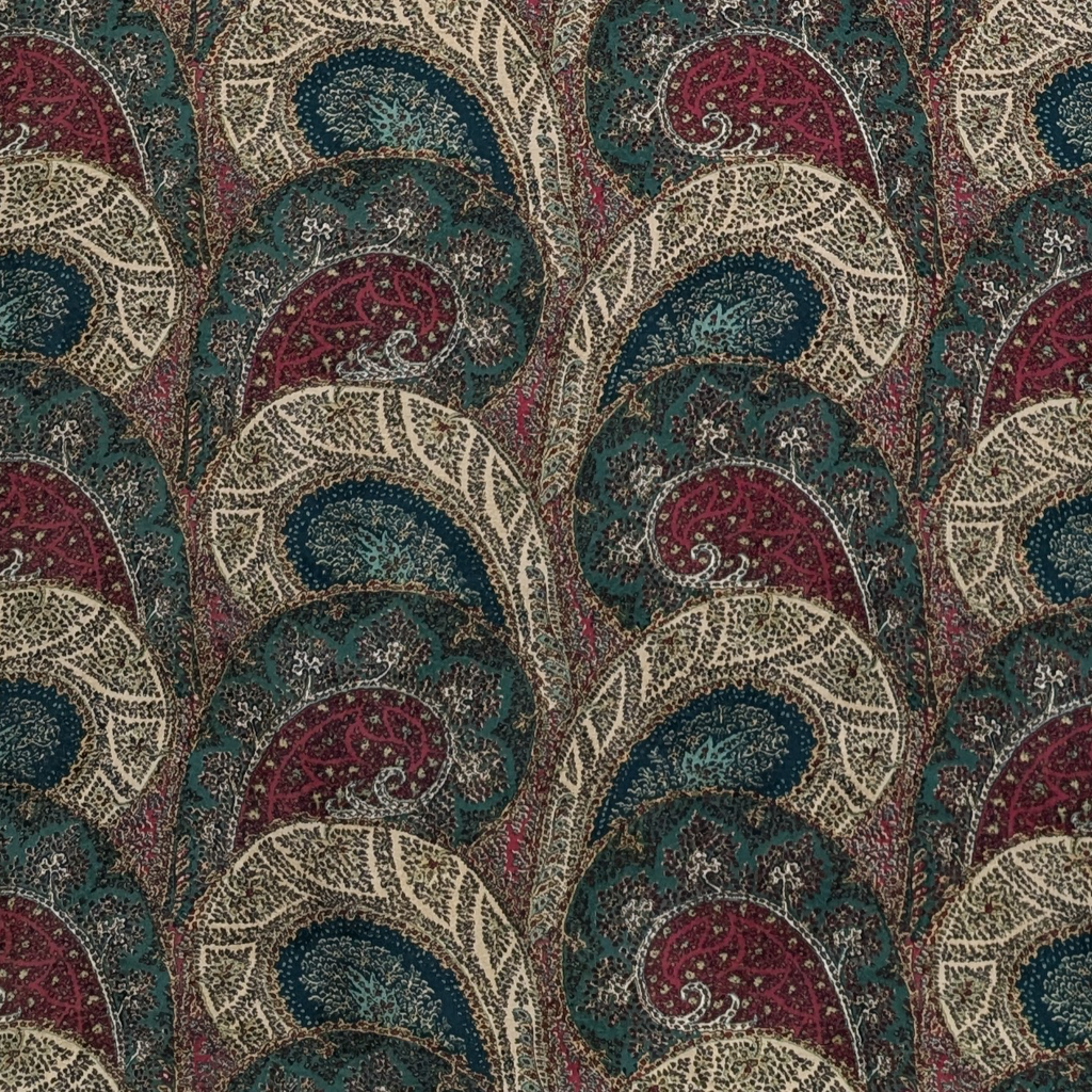 Paisley patterned fabric with a repeating design in red, blue, and beige.