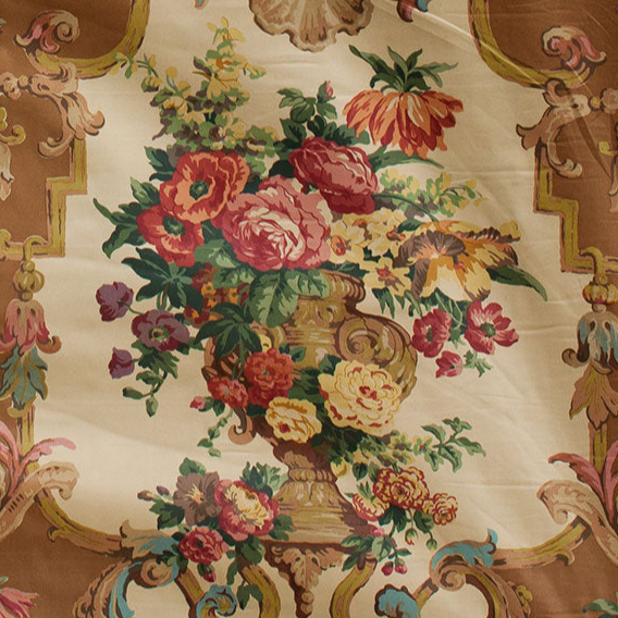 Decorative fabric with floral bouquet and ornate border