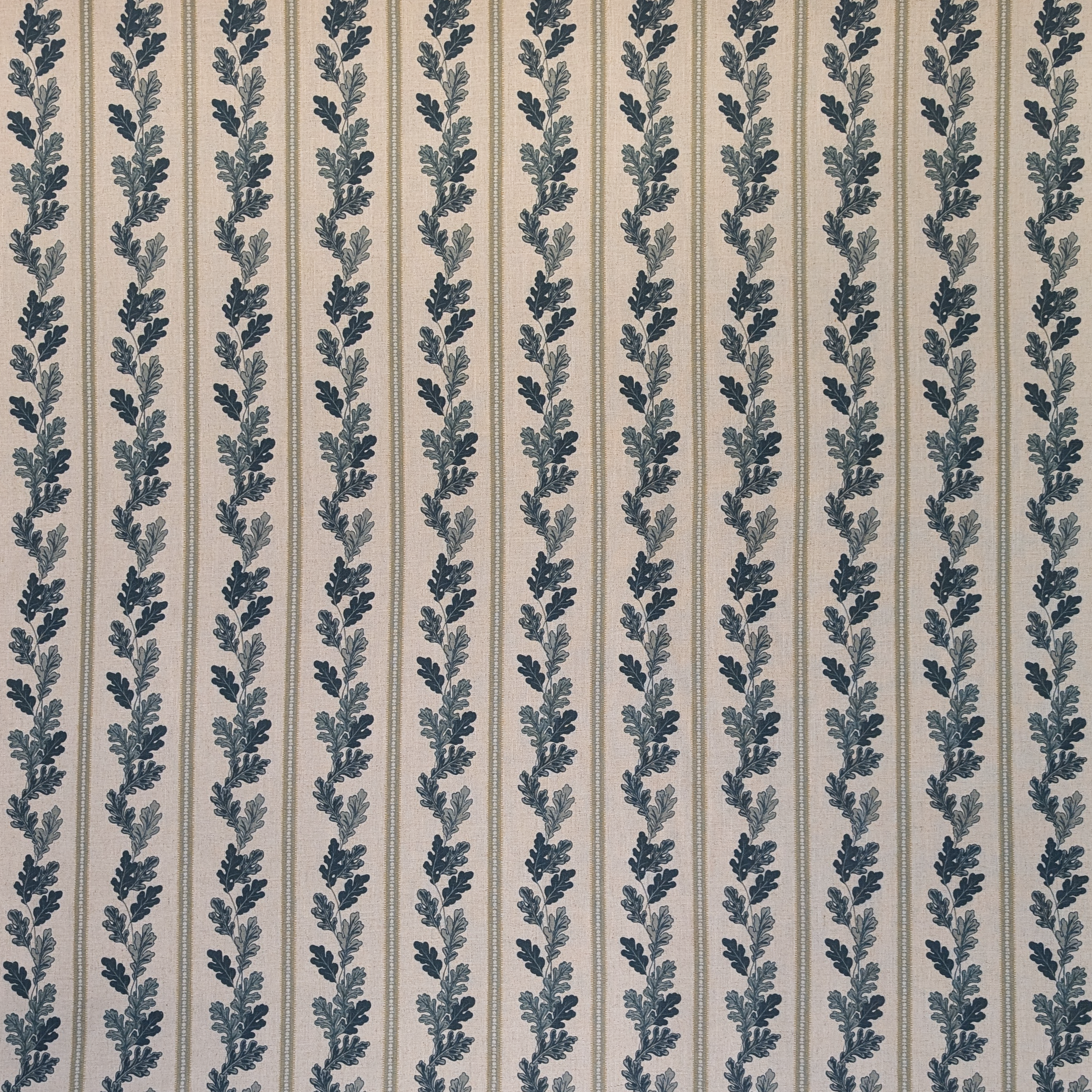 Striped linen fabric with blue oak leaves 