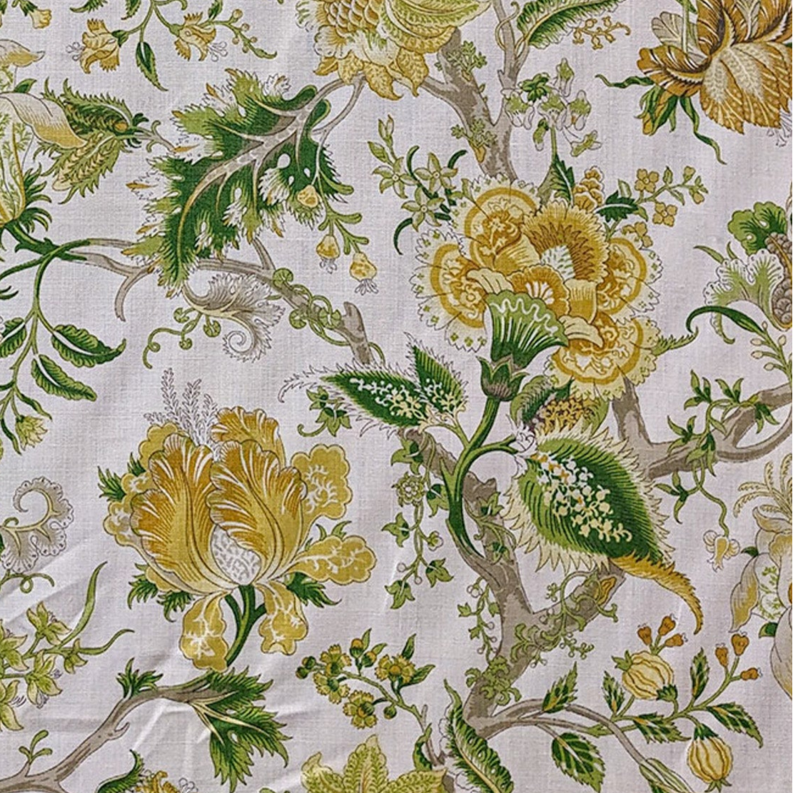 Floral and botanical pattern with yellow and green flowers on a light background