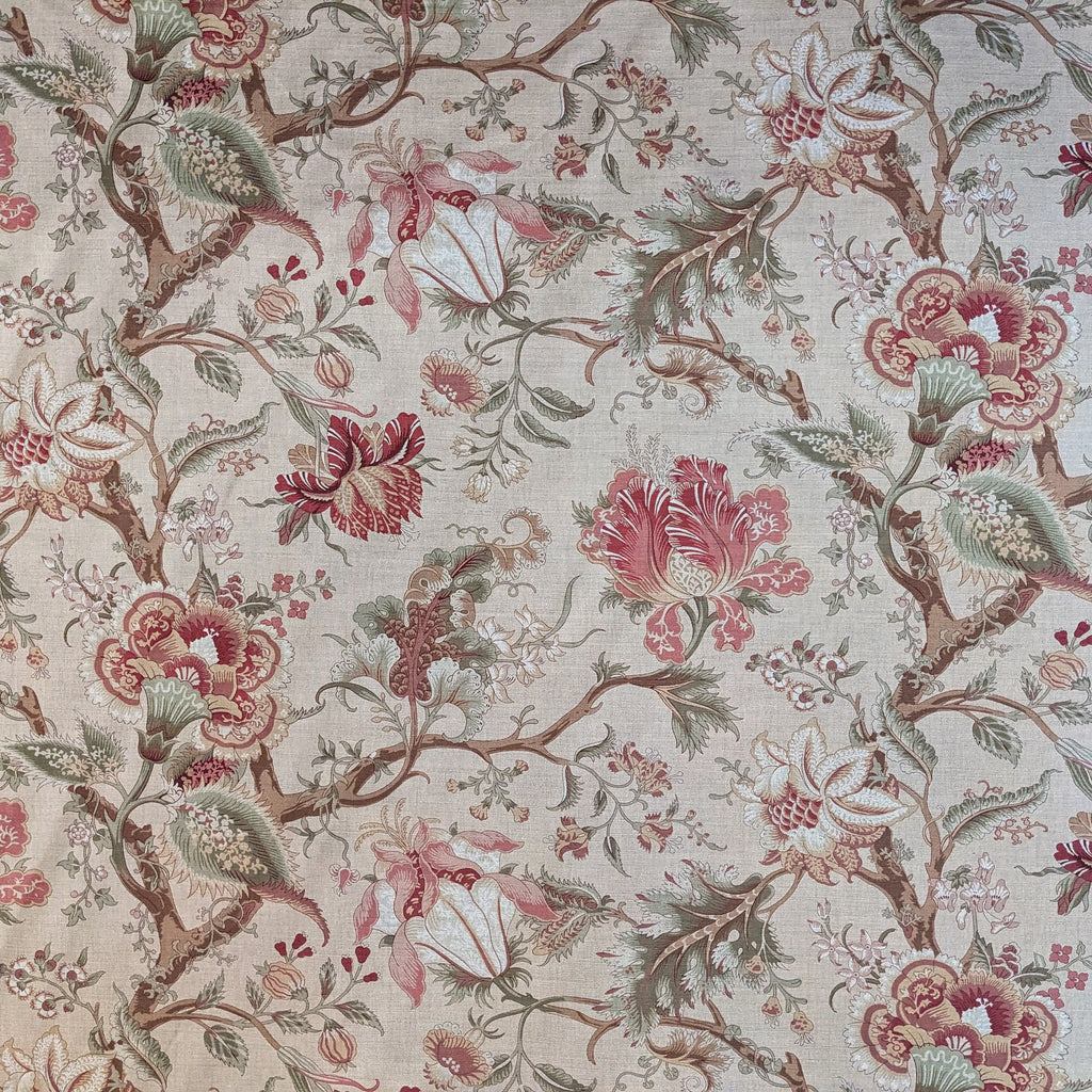 Floral patterned fabric with pink, green, and brown colors on a beige background.