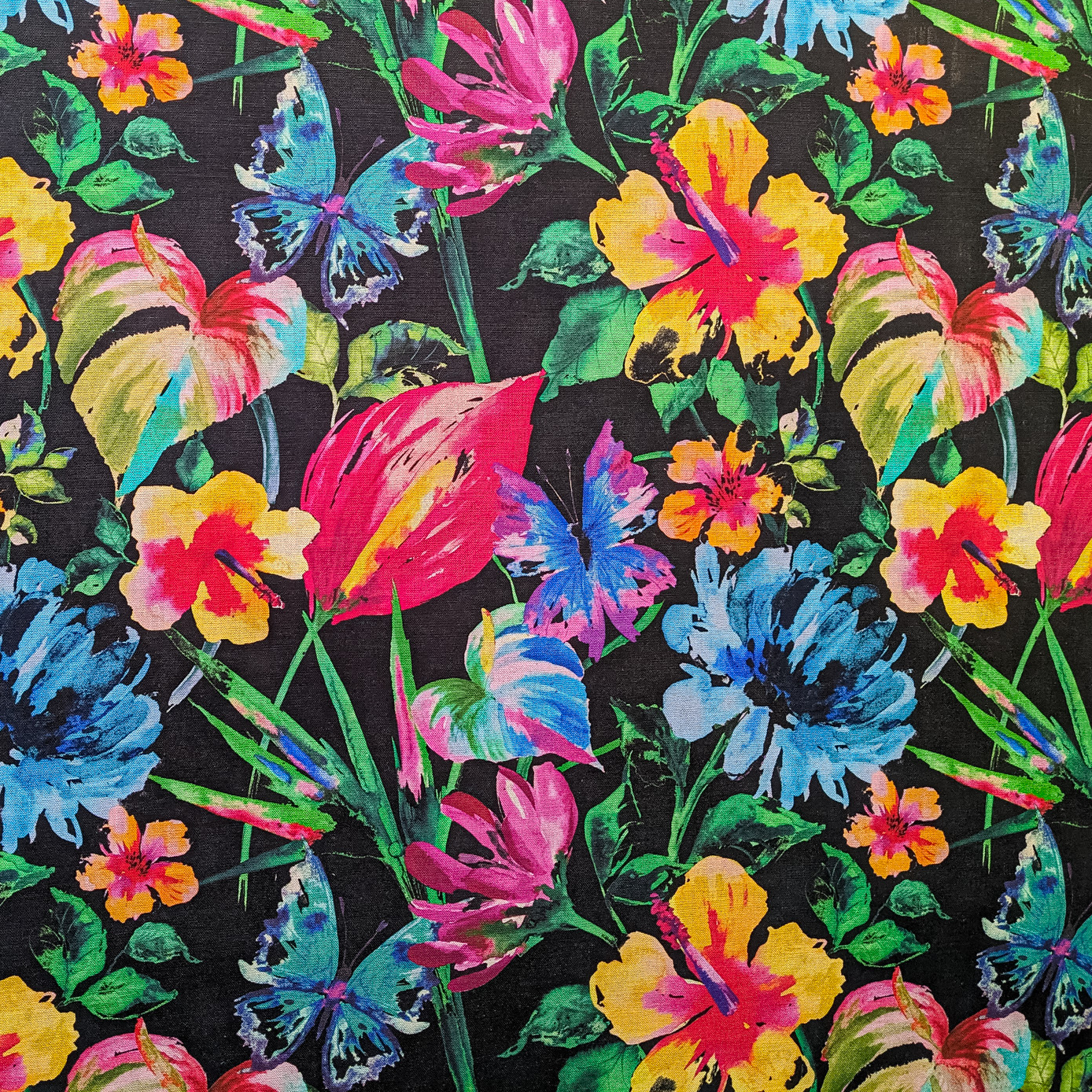 Vibrant yellow pink blue and green tropical floral print