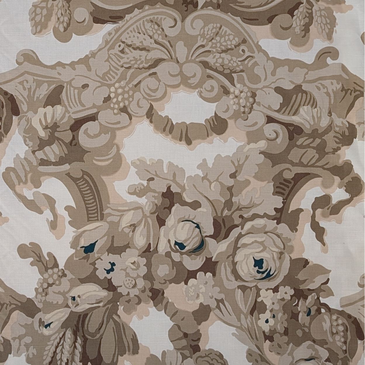 Decorative fabric with intricate floral and animal pattern in brown and beige tones.