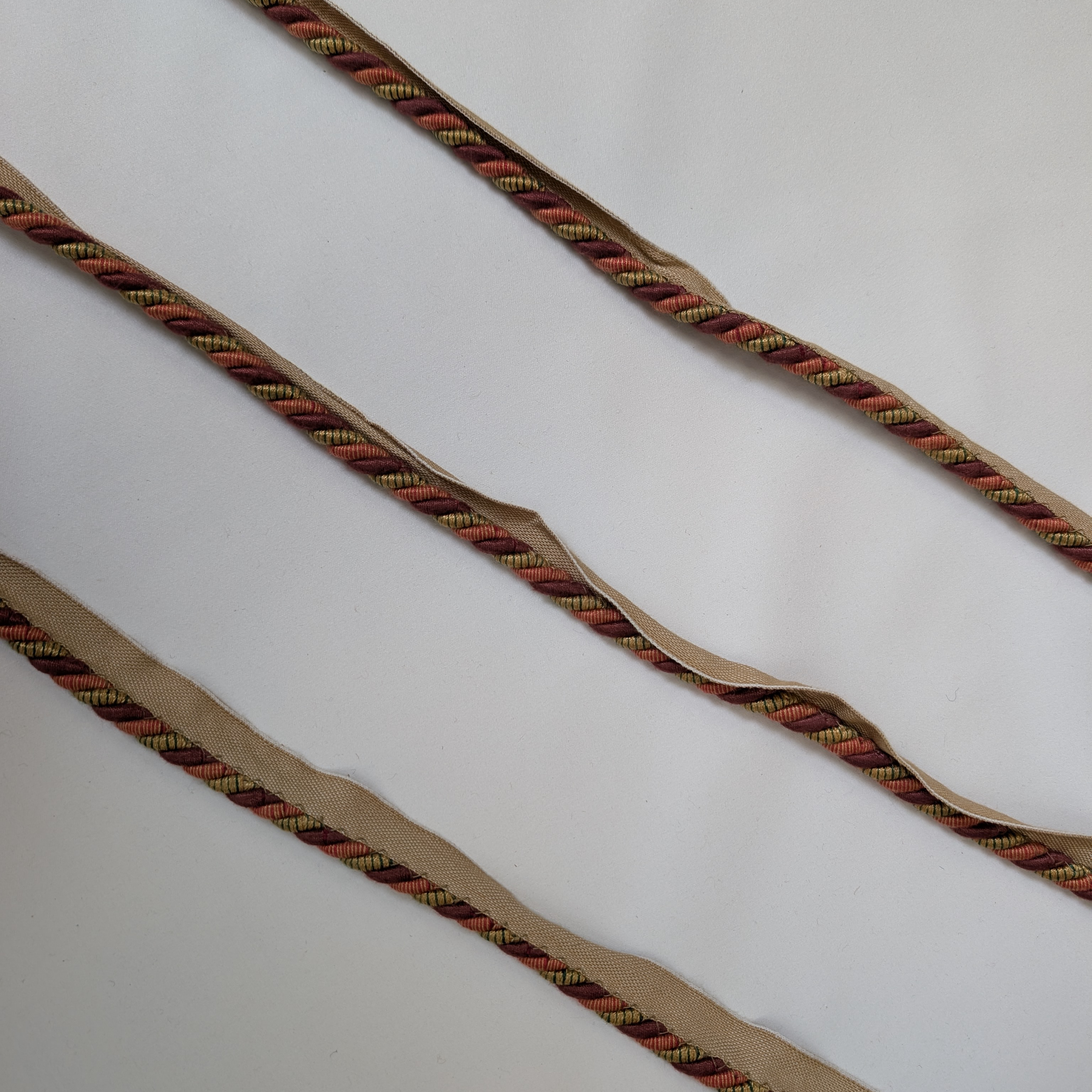Red and beige flanged rope trim 