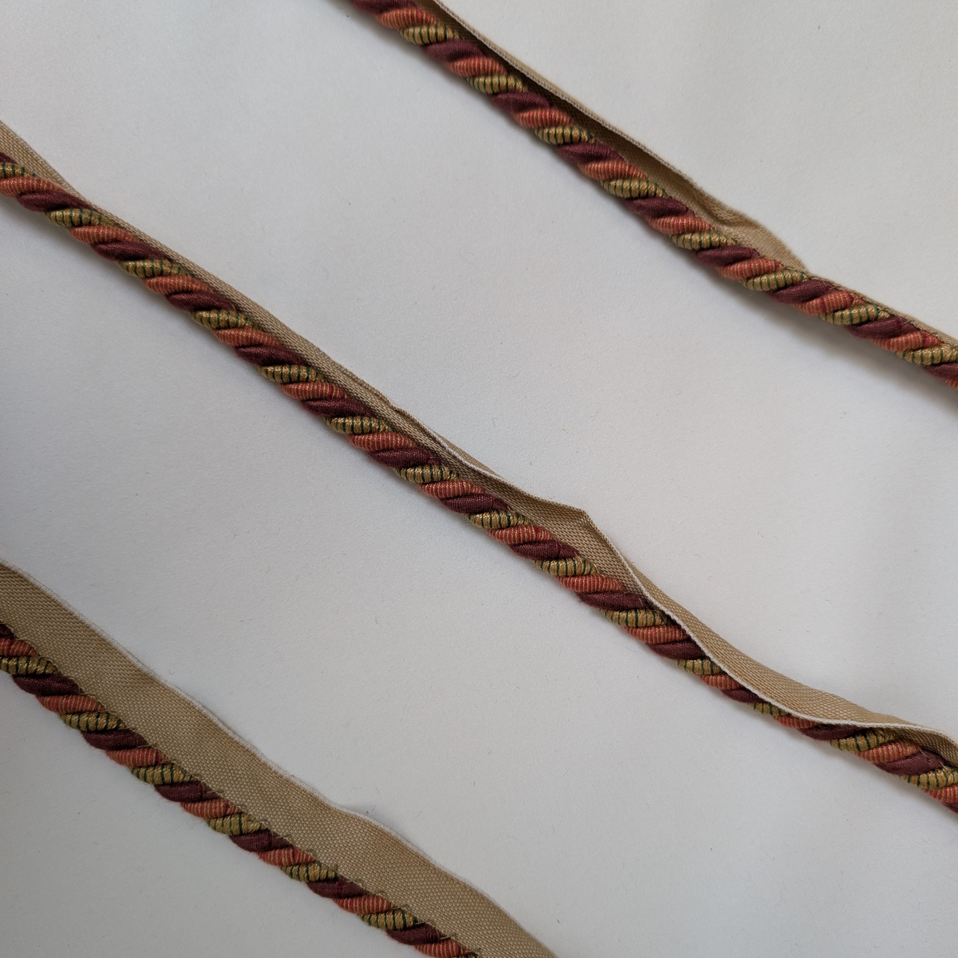 Red and beige flanged rope trim 