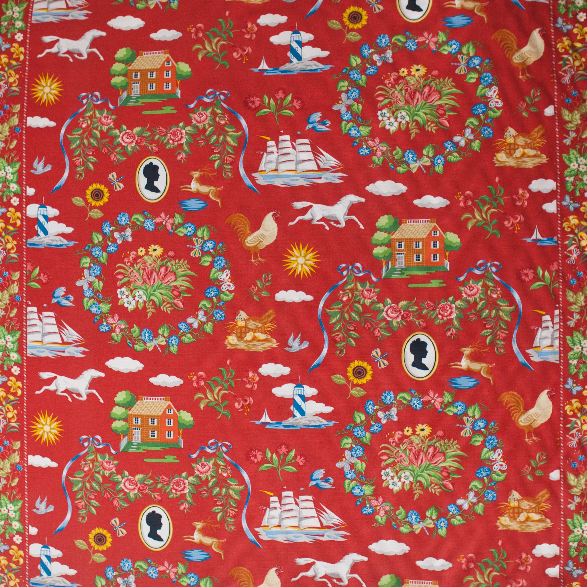 Colorful fabric pattern with various elements on a red background