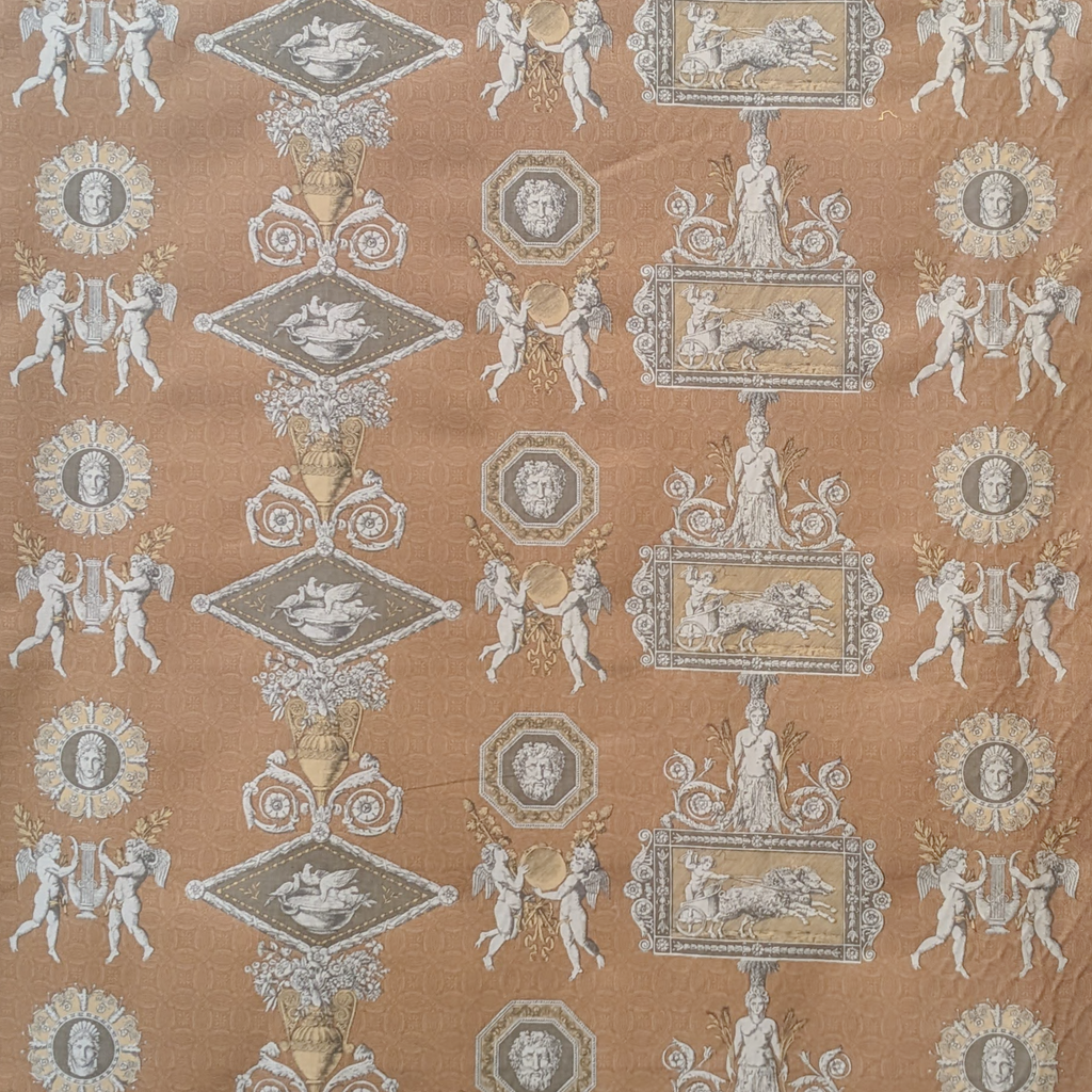 Decorative fabric pattern with classical designs on a brown background
