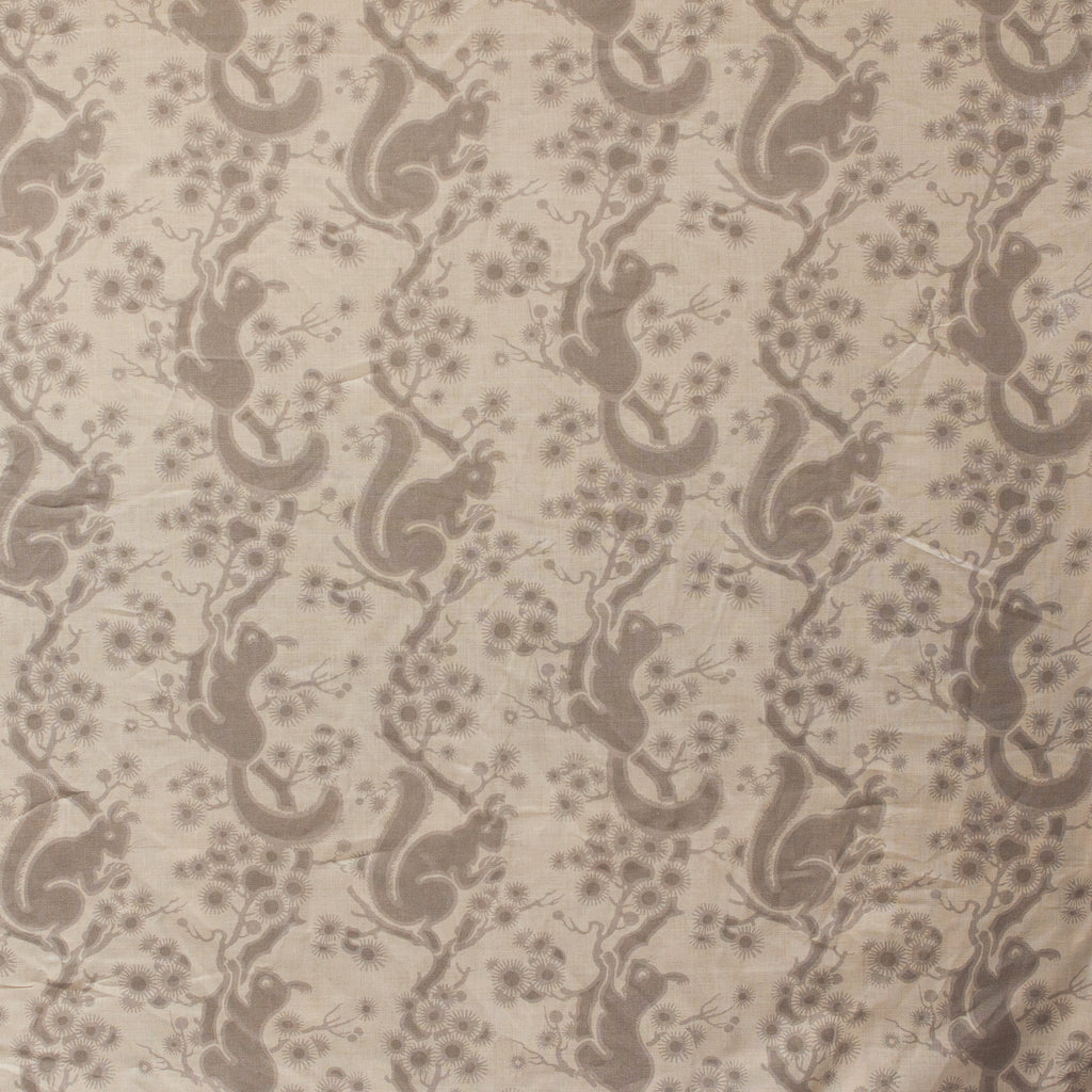 Pattern of squirrels and branches on a beige background