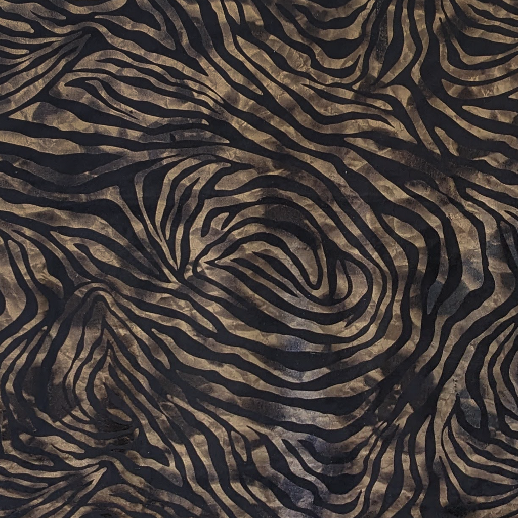 Fabric with black and brown zebra stripe pattern