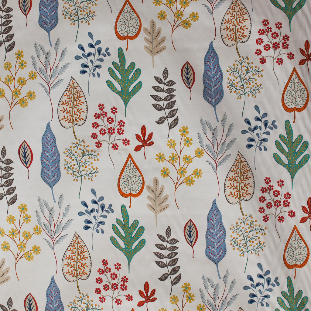 Multi coloured leaf design on white fabric background