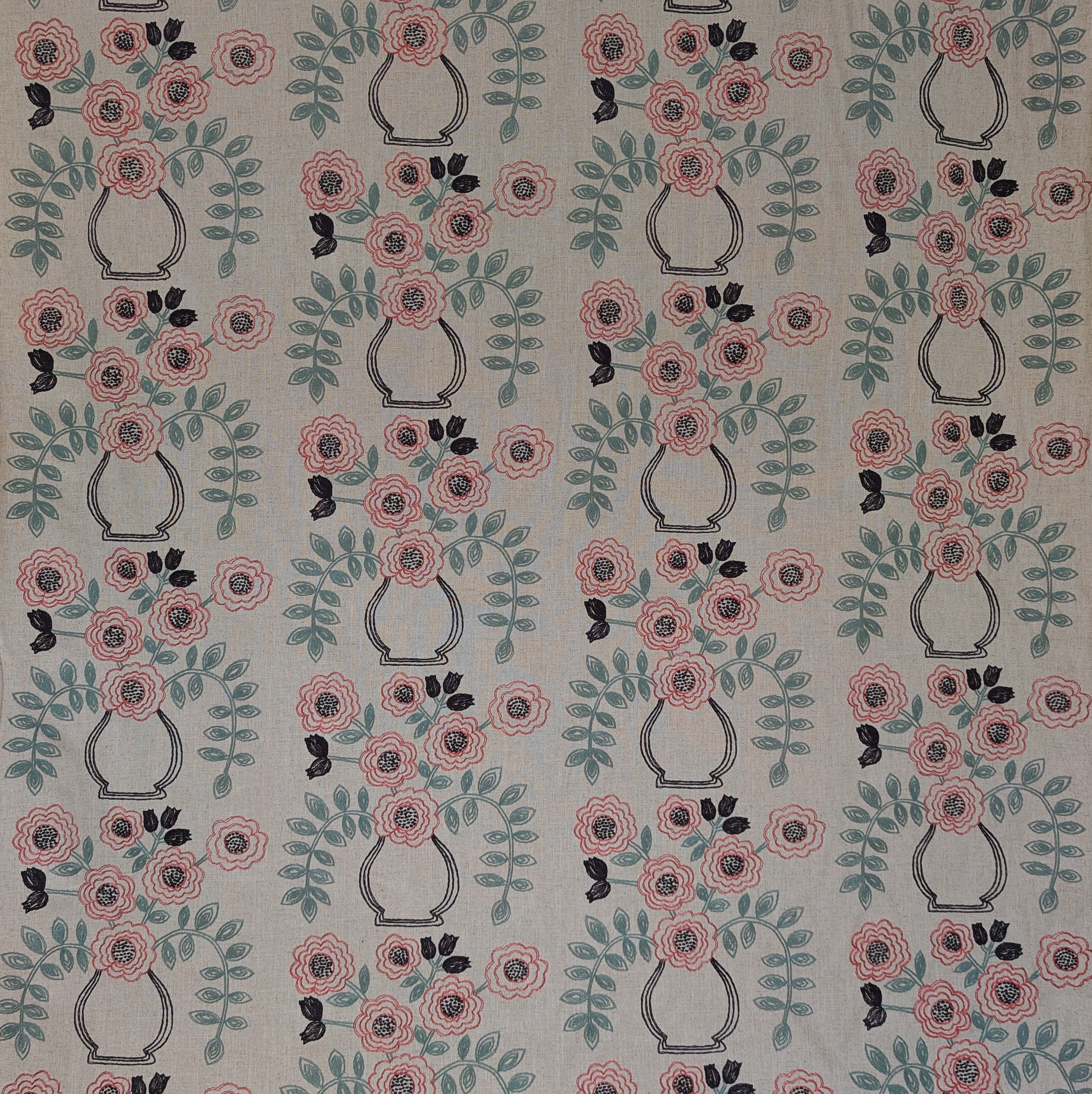 Patterned fabric with floral and vase designs on a gray background