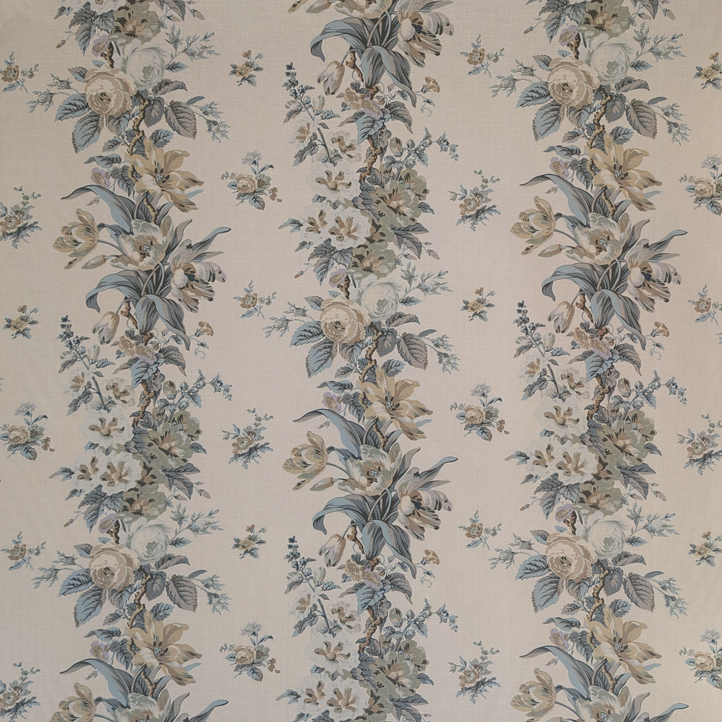 Floral patterned fabric with blue and beige flowers on a beige background